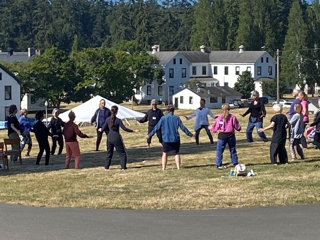 Qigong in outdoor setting with Rose Allen